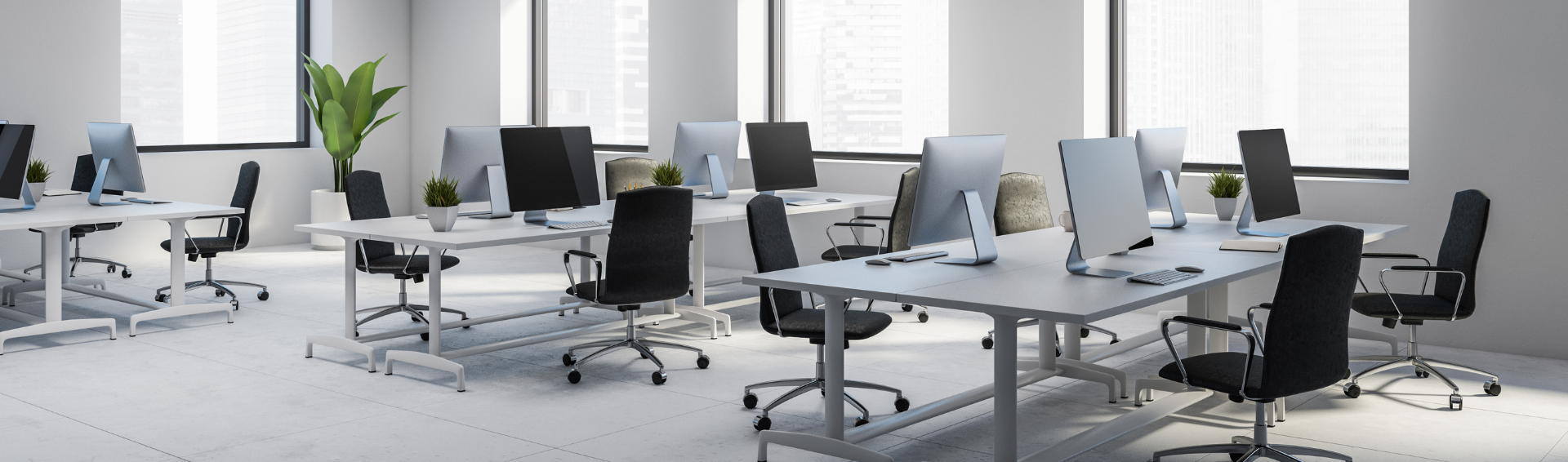 Bureau moderne avec ordinateurs et plantes