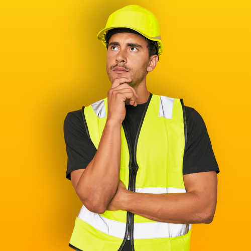 Homme avec un gilet jaune et un casque